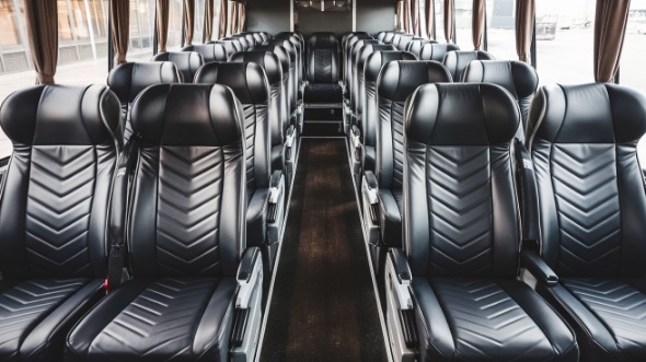 56 passenger charter bus inside boulder